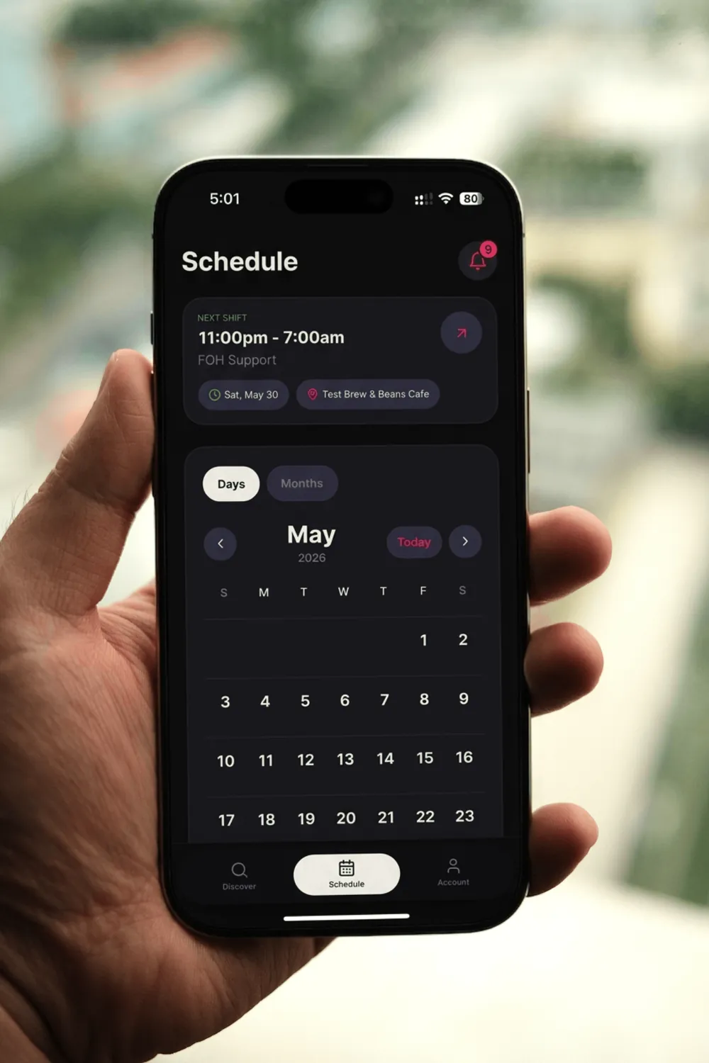 Hustl Schedule screen with a monthly calendar of shifts